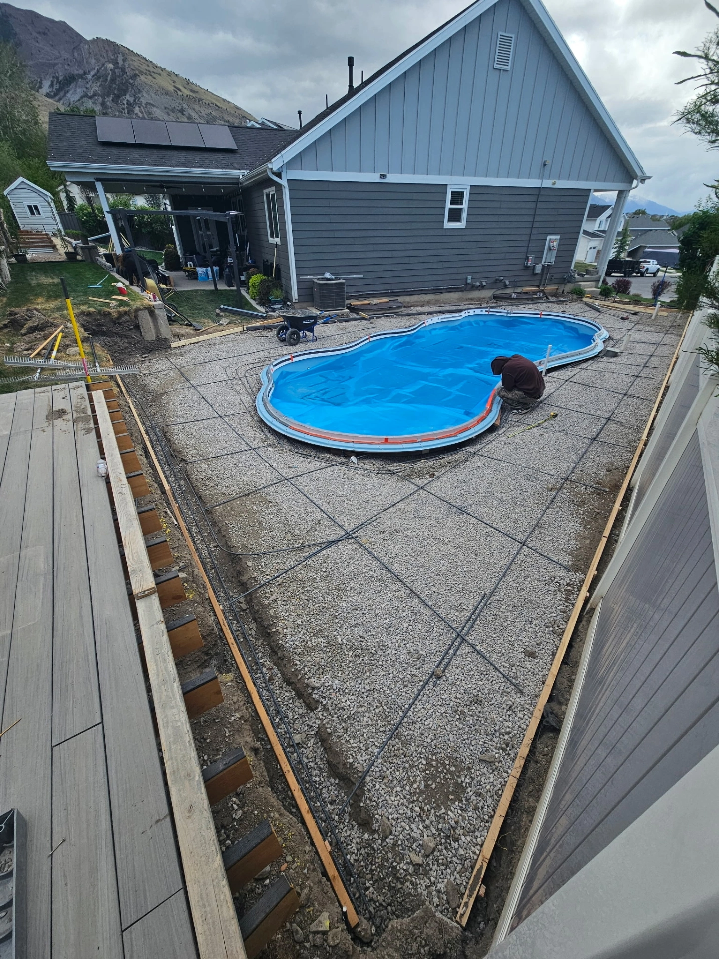 Step 4 — Rebar grid tied across the deck pad, ready for the concrete pour